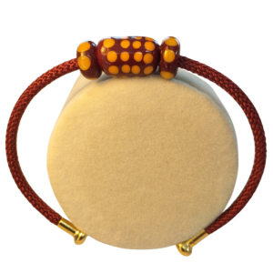 Bracelet jonc nylon bordeau avec perles de verre bordeaux à pois orange